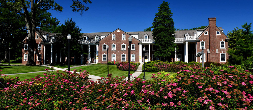building with pink flowers in front