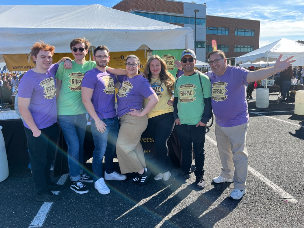 A group photo of Dr. Dworkin and RIPPAC students at Homecoming 2024