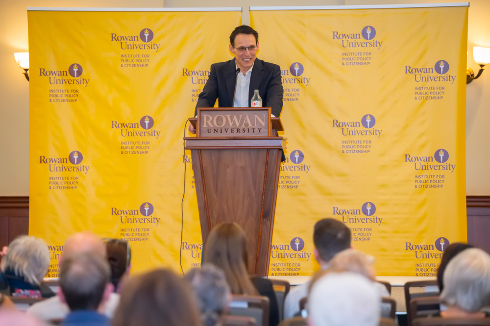 Steve Kornacki at the podium during RIPPAC's December Speaker Series event