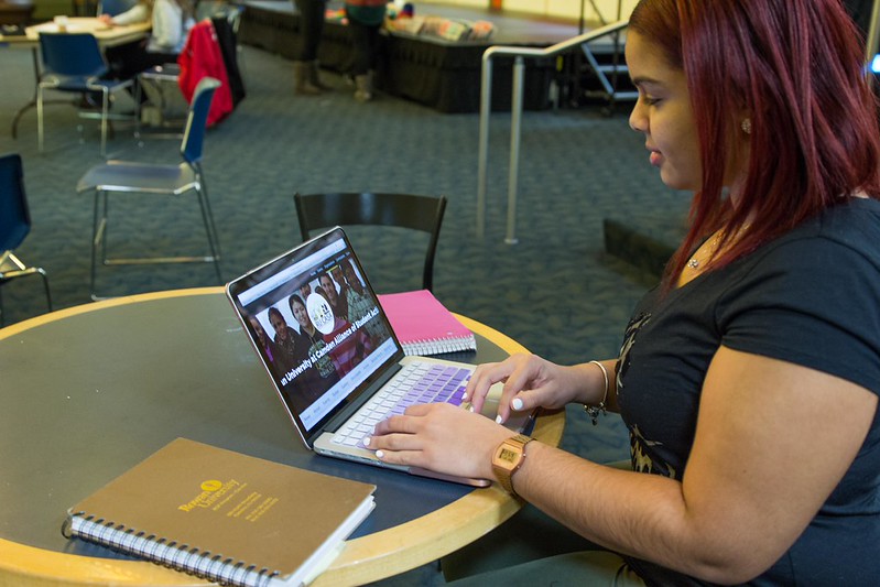 A Rowan University student staying productive with online work.