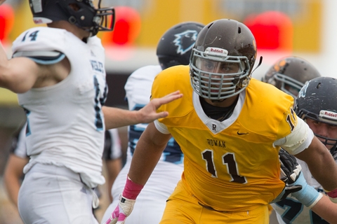 Rowan football player in university gold and brown.
