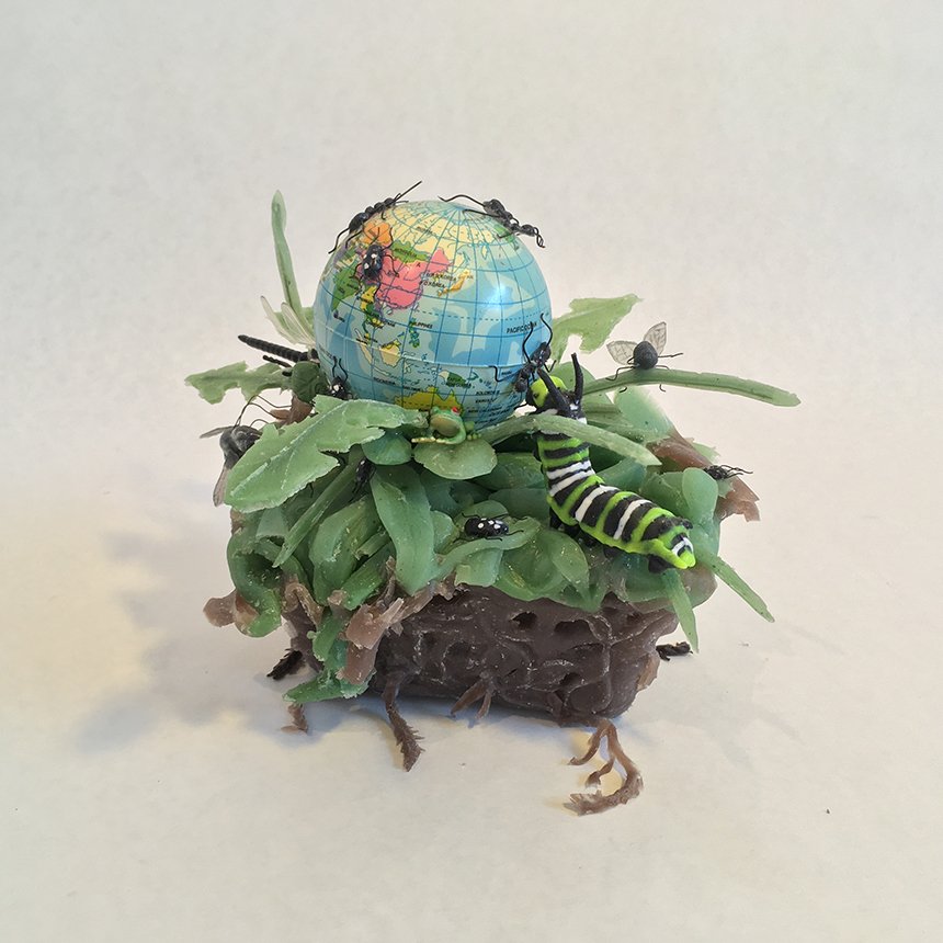 Earth, globe, caterpillar, flies, ants, beetles by Jeanne Silverthorne