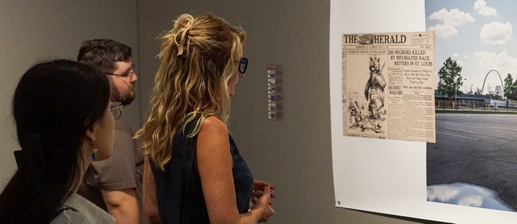 Visitors viewing art on display