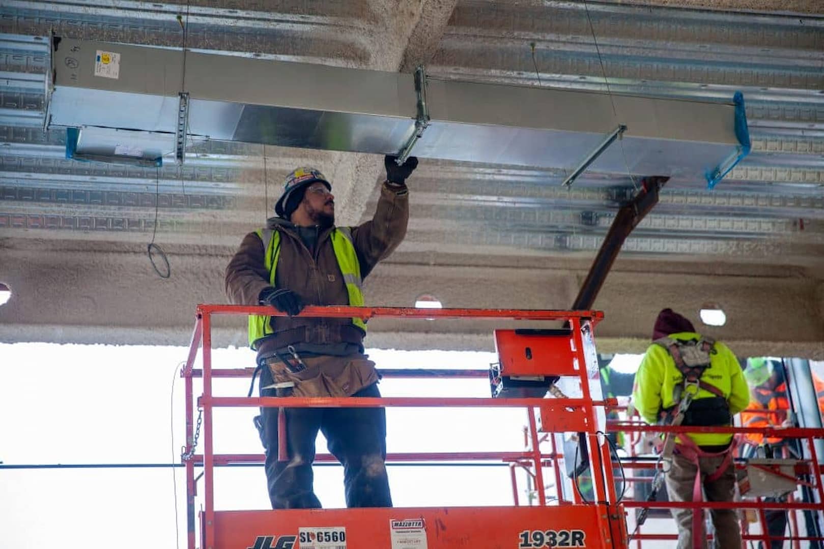 person working on project with tools