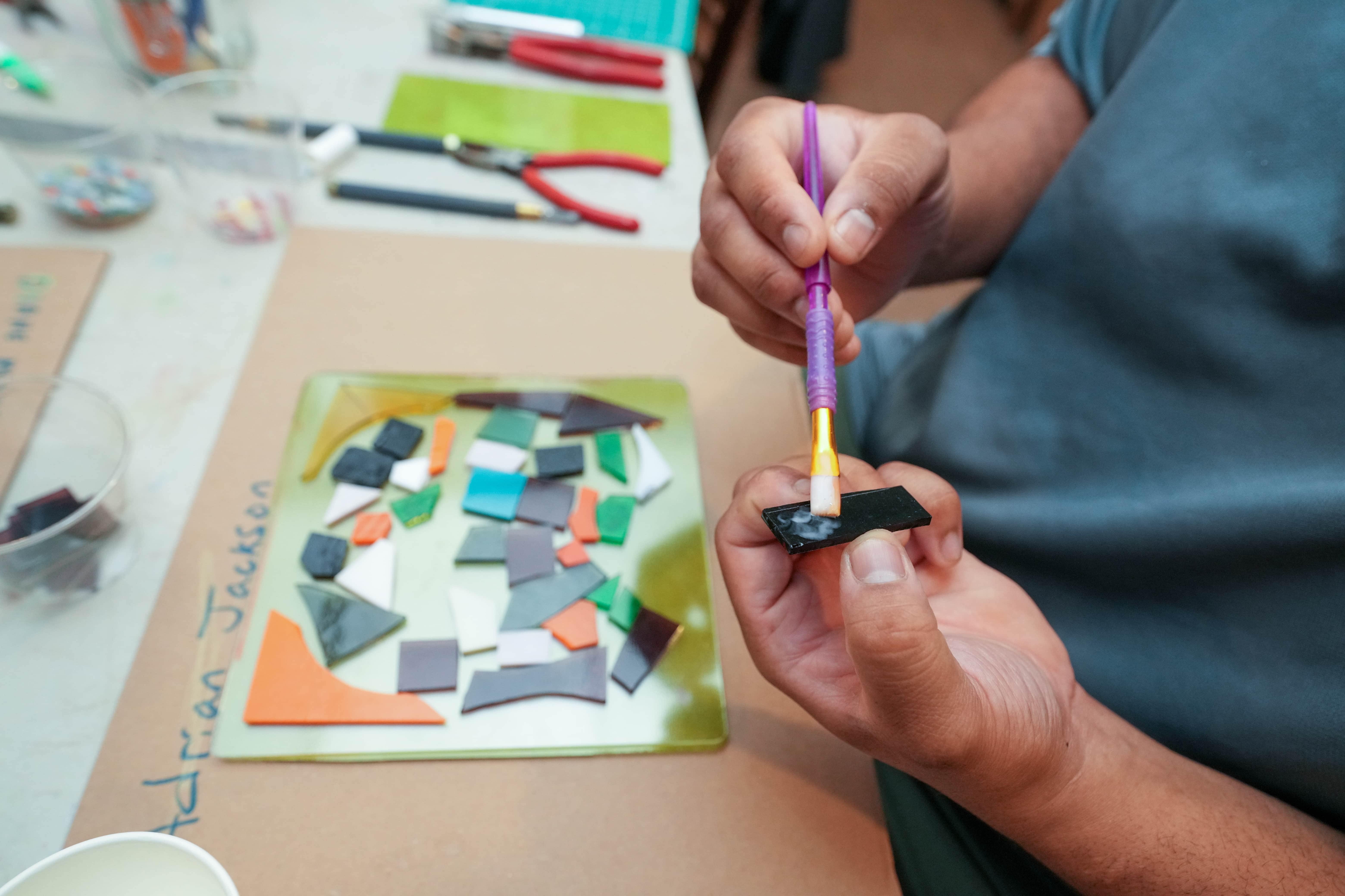 Two people glassmaking