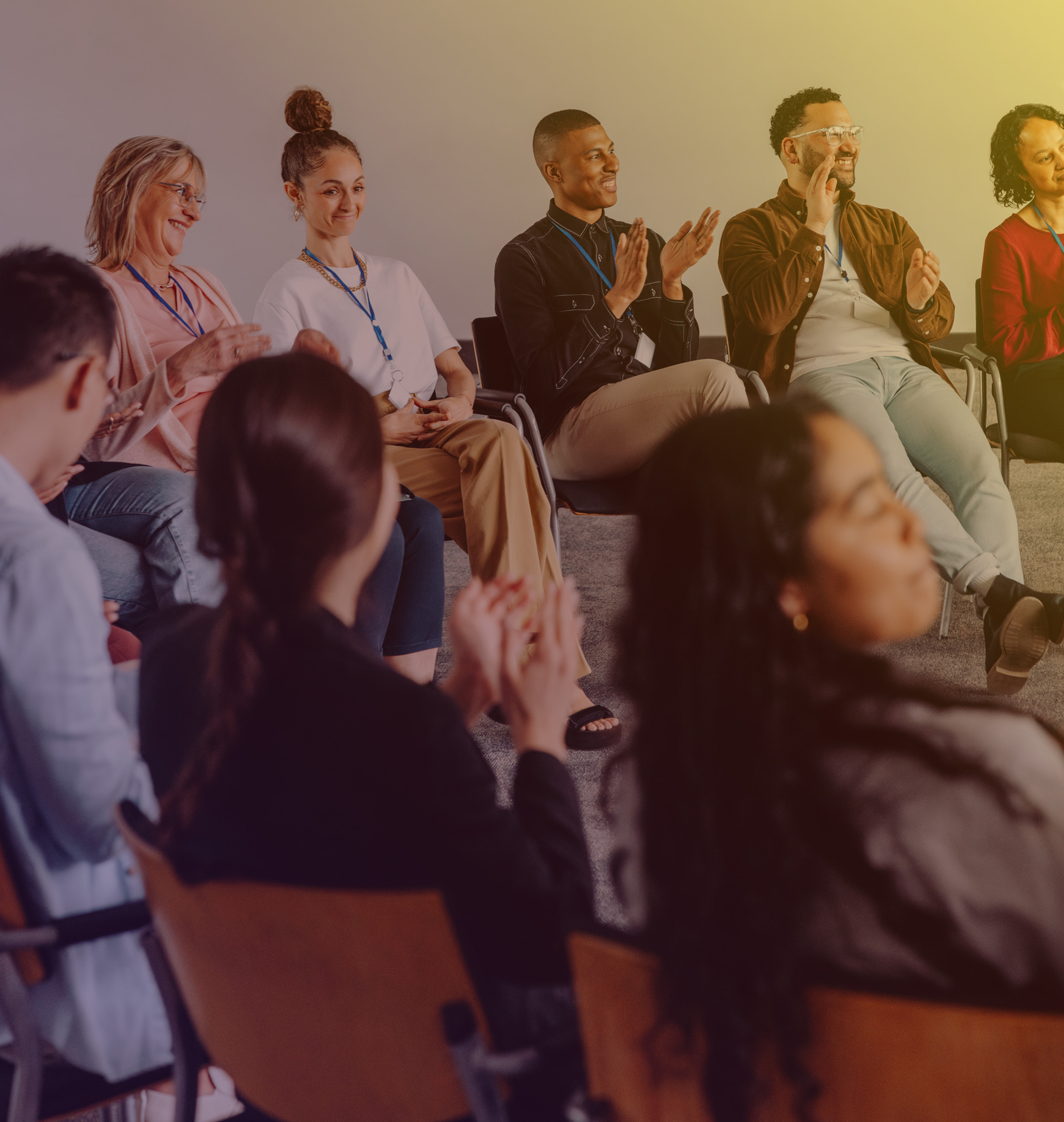 Group of People sitting together in conference room