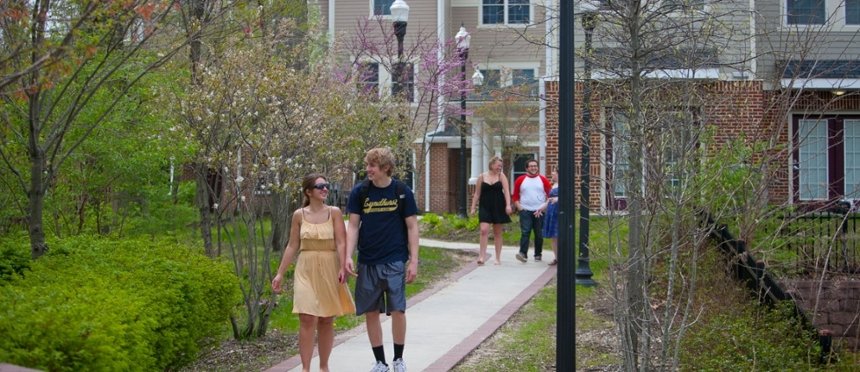 Students walking in the summer months on the paths near the Townhouse complex at Rowan University.
