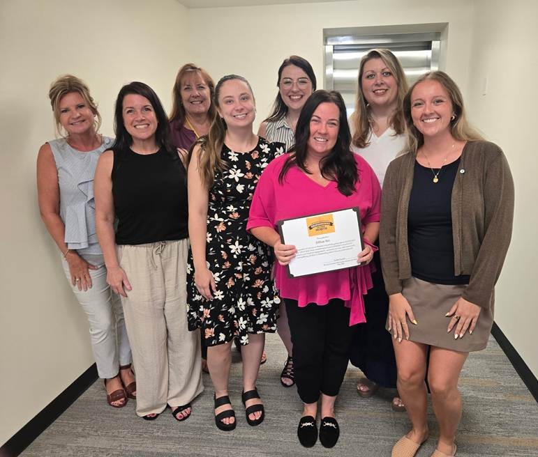 Team photo with Prof of the Month honoree Jill Itri
