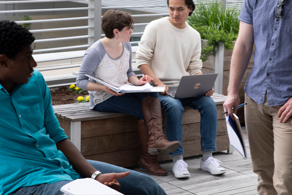 students with laptops