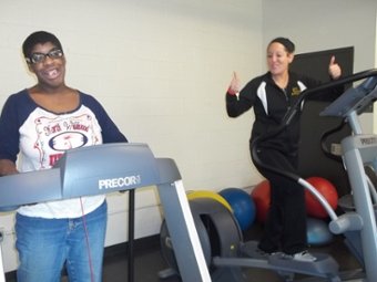 a GetFIT participant and Rowan student on treadmills