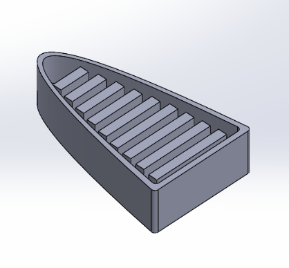 Image of Fish body mold with rectangular channels.