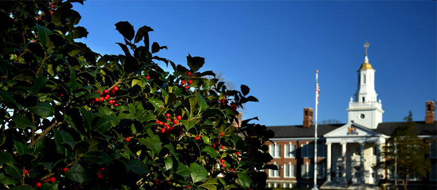 university building with blooms out front