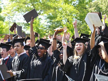 students celebrating at Commencement