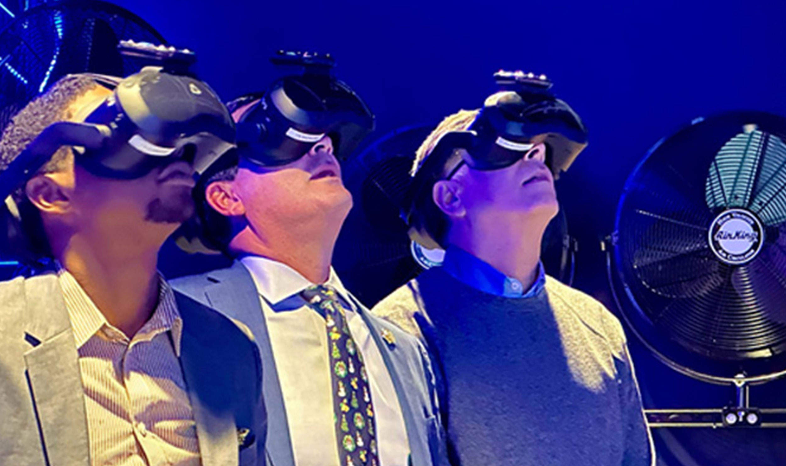president houshmand, chancellor lowman and student wearing virtual reality headsets