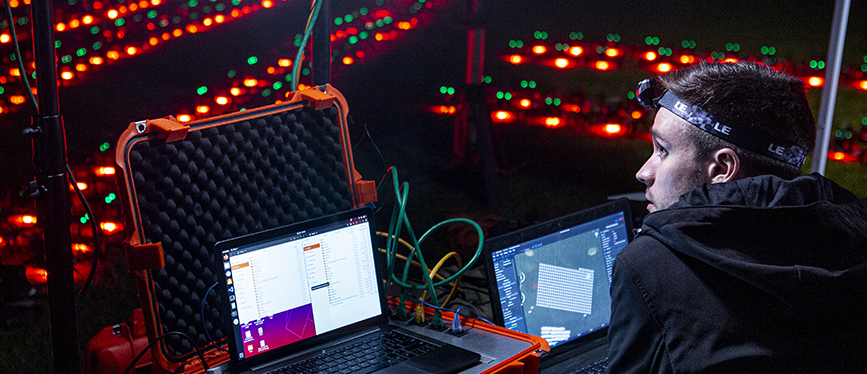 Verge Aero co-founder Tony Samaritano prepares for the Verge Aero drone light show test at Rowan's West Campus.