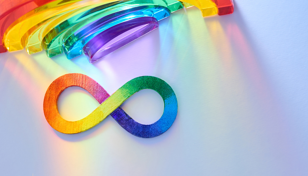 a rainbow with its ray reflecting on a rainbow infinity sign