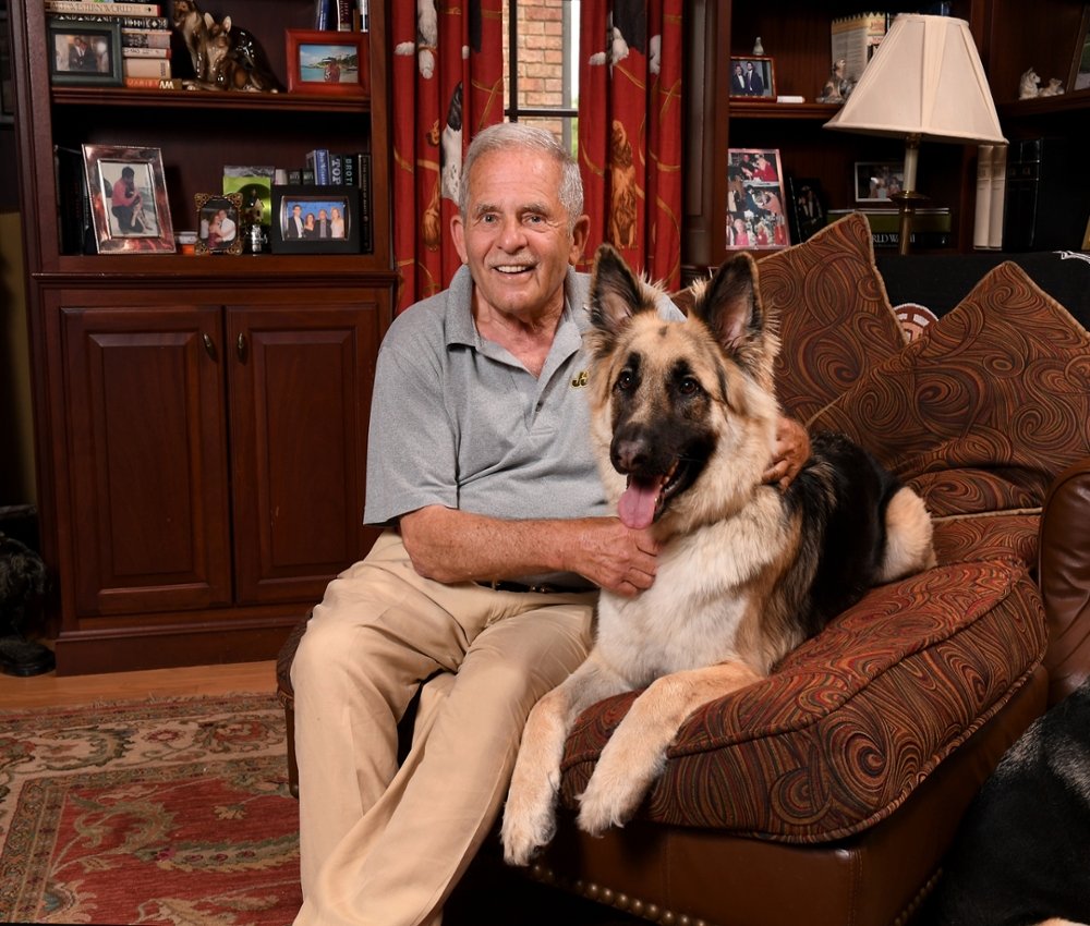 (Image Description: Picture of Gerry Shrieber with his dog, Hacci)