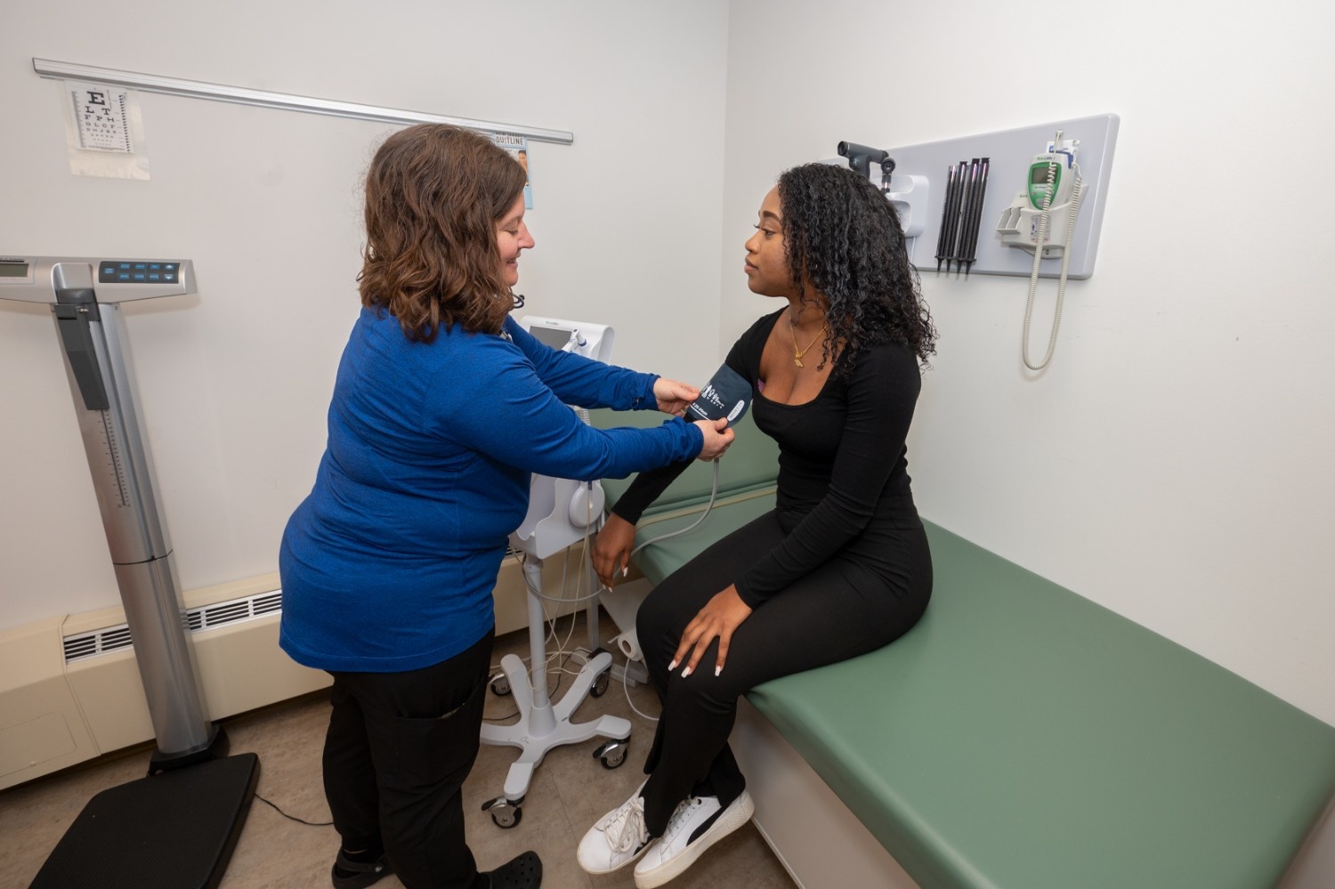 nurse interacting with patient