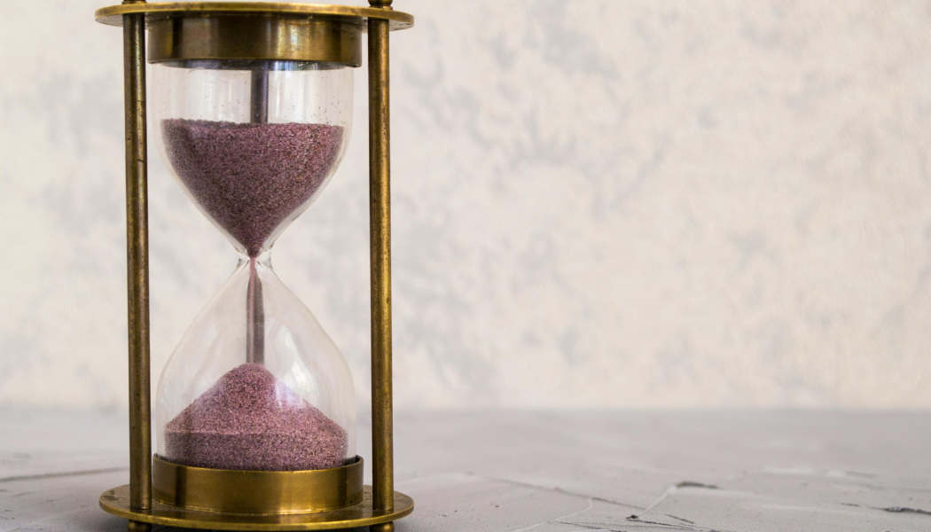 an hour glass with sand